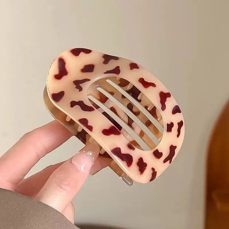 Ovala platt hårklämma